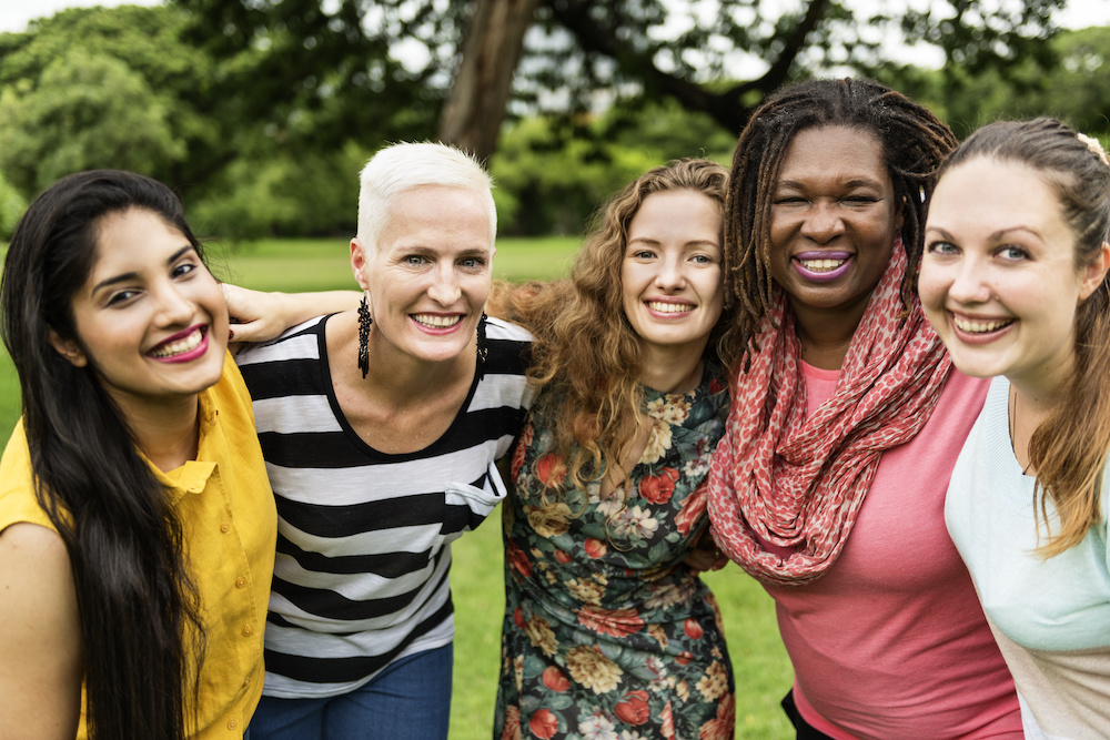 female candidates socialize in a circle